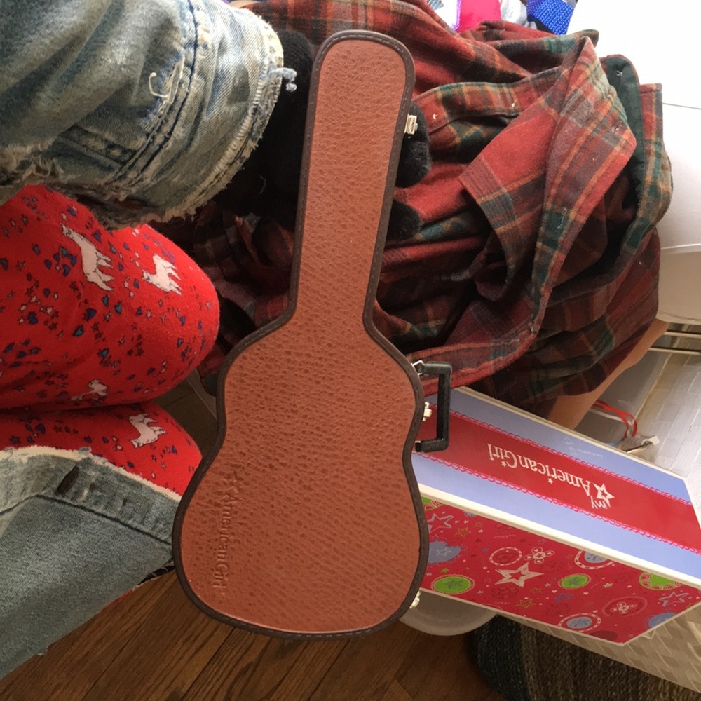 An amazing perfectly new American girl guitar